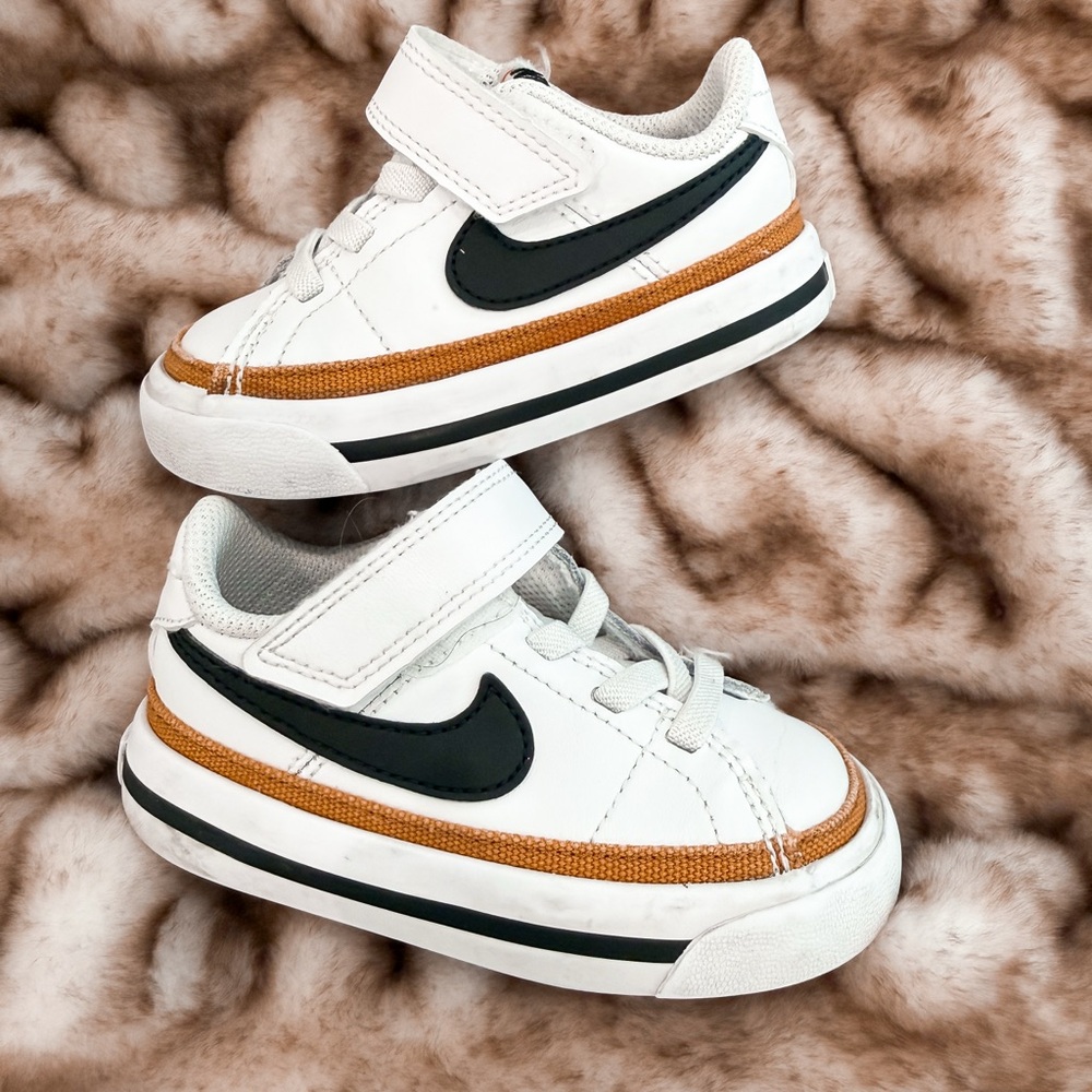 Nike Kids White Sneakers with Black Swoosh and Tan Accent